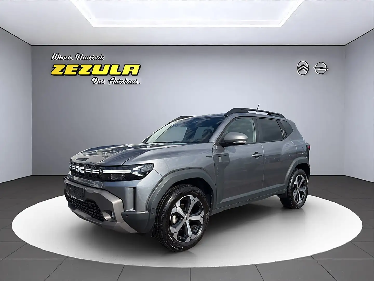 Dacia Duster Journey TCe 130 mHev Grau - 1