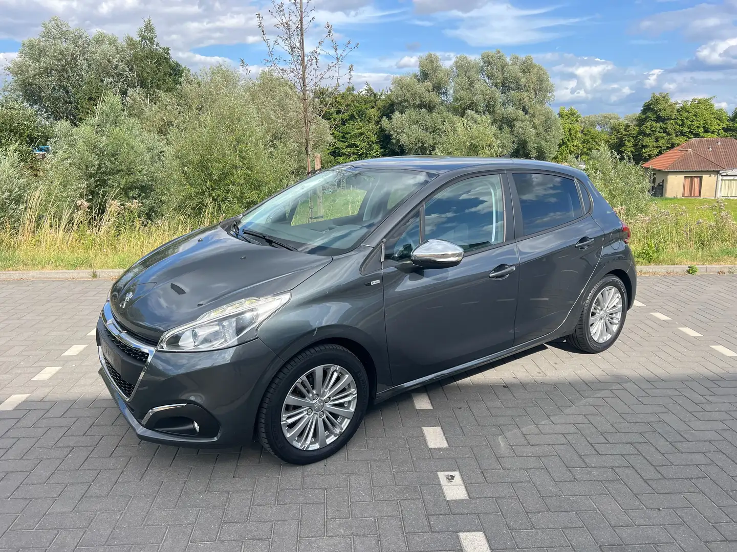 Peugeot 208 1.2i-AIRCO-GPS-JANTES + CARNET COMPLET ! Zilver - 1