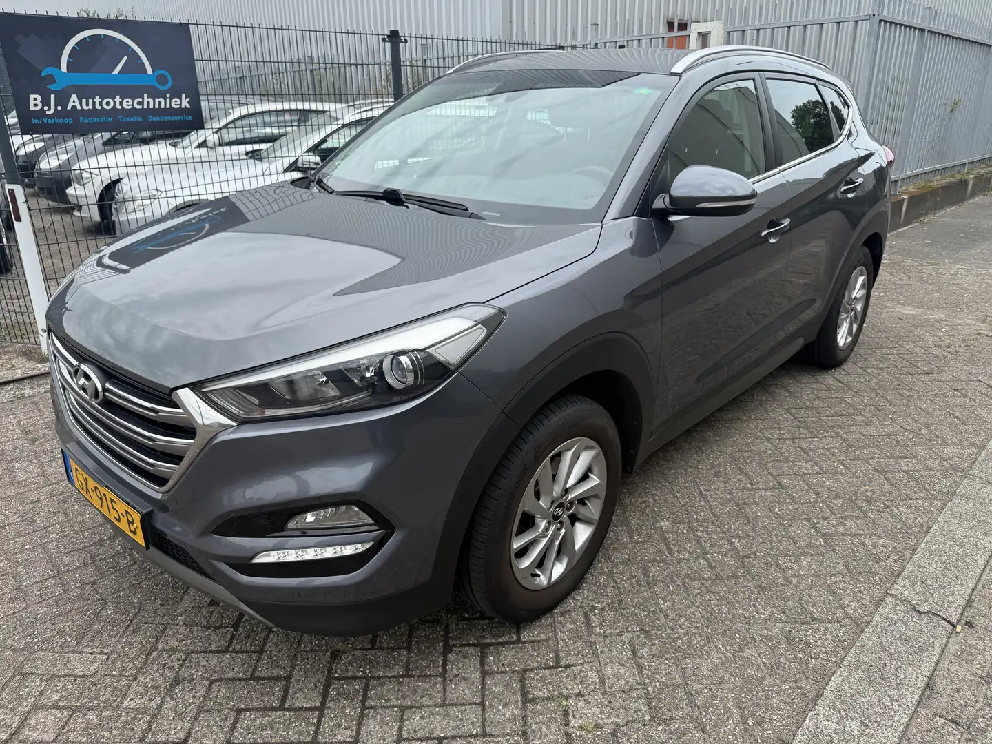 Hyundai TUCSON 1.6 GDi Comfort Grijs - 1