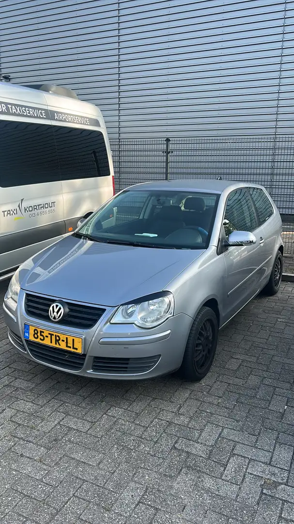 Volkswagen Polo 1.2-12V Optive Grijs - 1