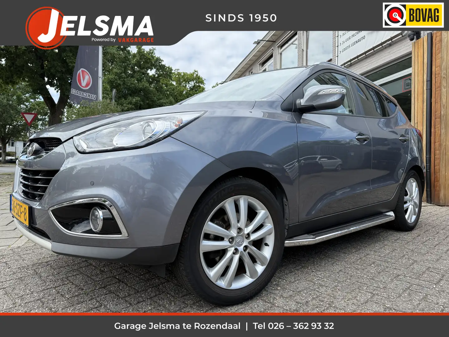 Hyundai iX35 2.0i i-Catcher Aut., Panoramadak | Trekhaak | Navi Grijs - 1