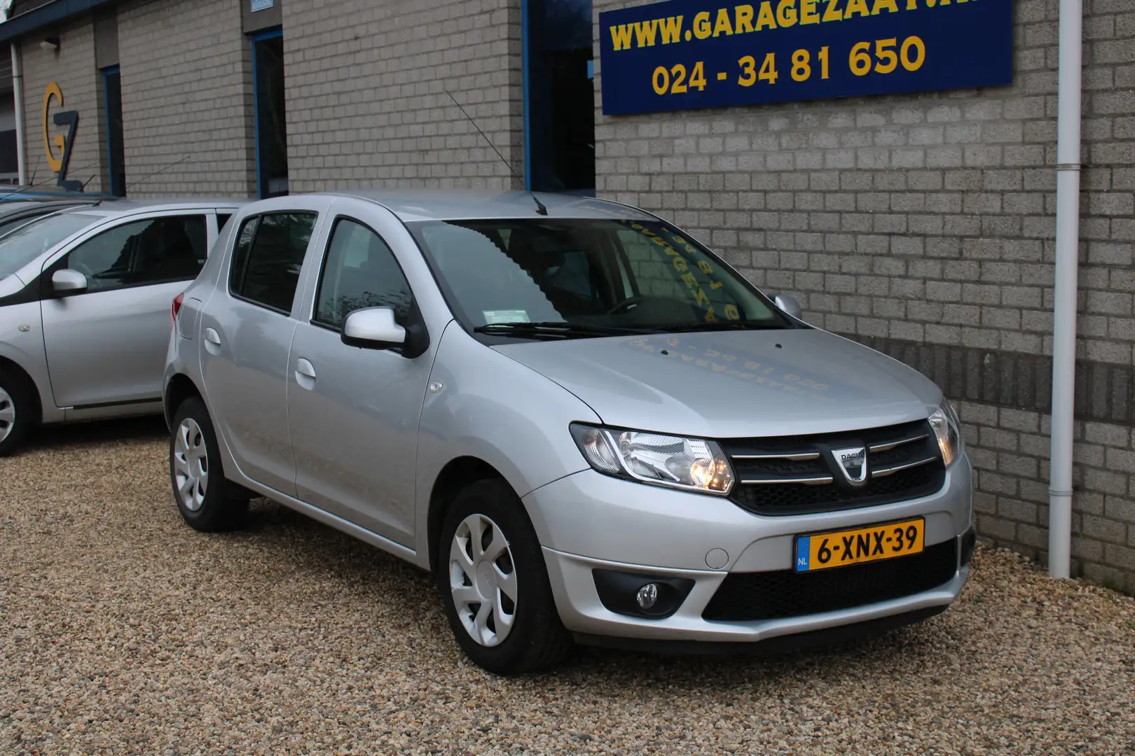 Dacia Sandero 0.9 TCe Lauréate Airco Navigatie weinig km Grau - 1