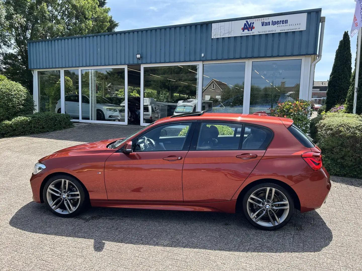 BMW 118 1-serie 118i High Executive M-Sport Oranje - 2