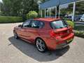 BMW 118 1-serie 118i High Executive M-Sport Oranje - thumbnail 3