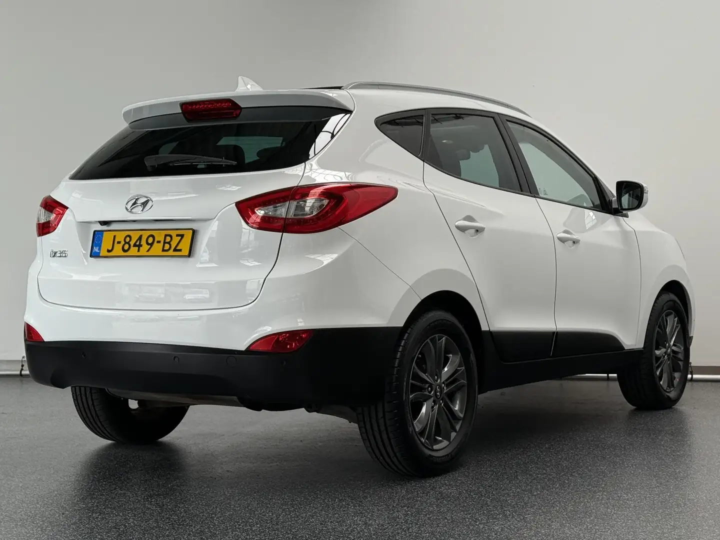 Hyundai iX35 1.6i GDI i-Catcher | Schuifdak | Leer | Camera | N Wit - 2