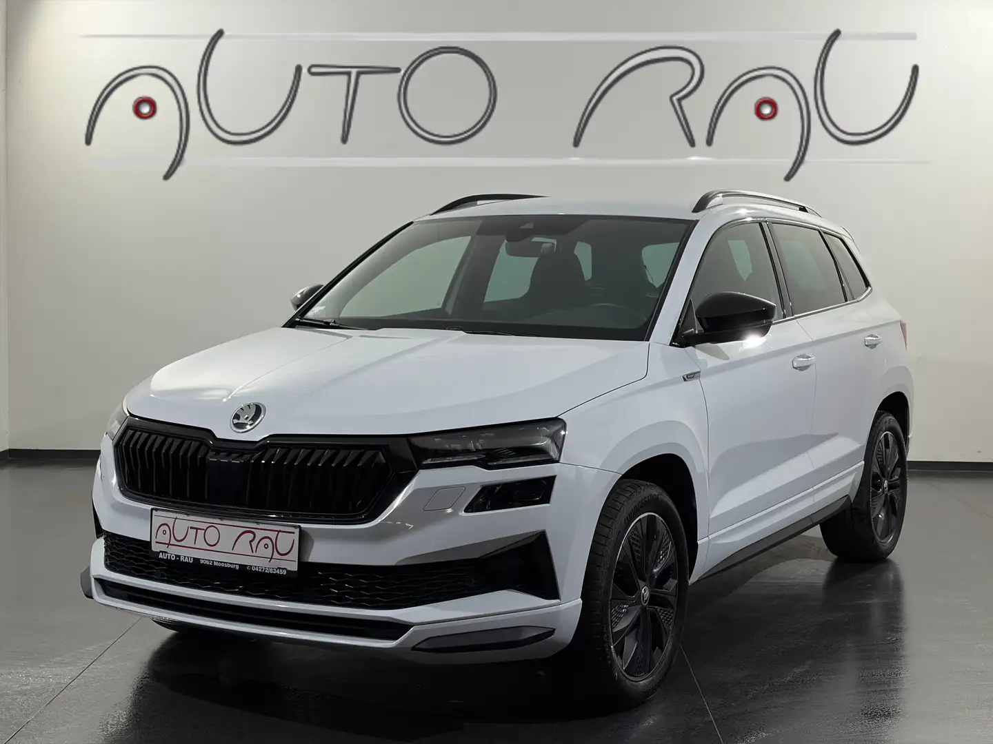Skoda Karoq 2.0 TDI Sportline 4x4 DSG *AHK*LED*NAVI* Weiß - 1
