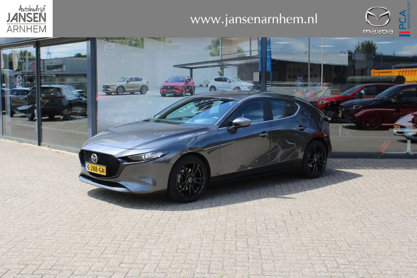 Mazda 3 2.0 e-SkyActiv-X M Hybrid 180 Comfort met Bose + l Grijs - 1