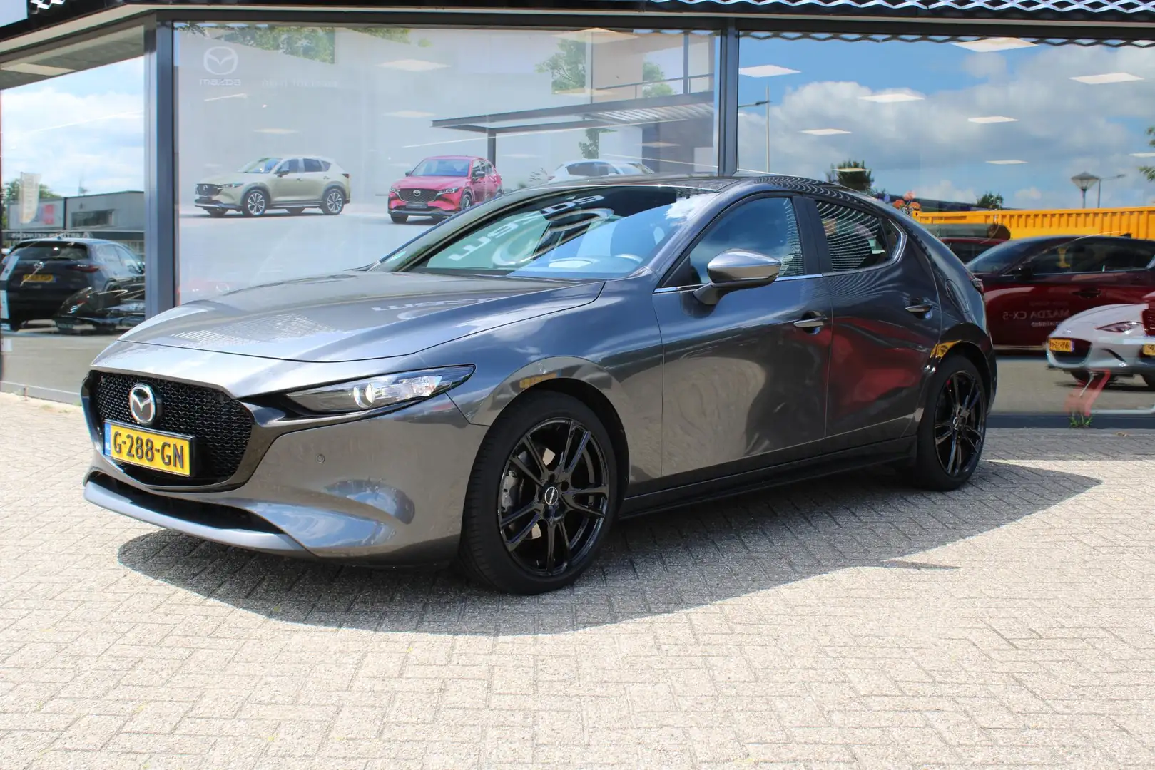 Mazda 3 2.0 e-SkyActiv-X M Hybrid 180 Comfort met Bose + l Grijs - 2