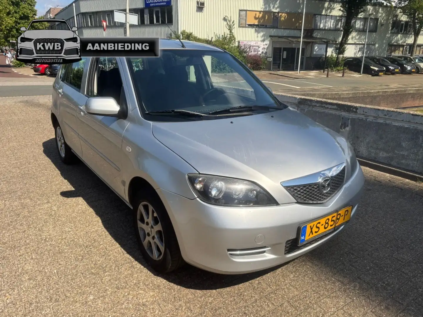 Mazda 2 1.4 Exclusive 5Drs airco apk tot 12-03-2026 Gris - 1