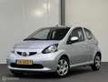 Toyota Aygo 1.0-12V + AUTOMAAT [ NAP 1e eigenaar airco ] Grijs - thumbnail 1