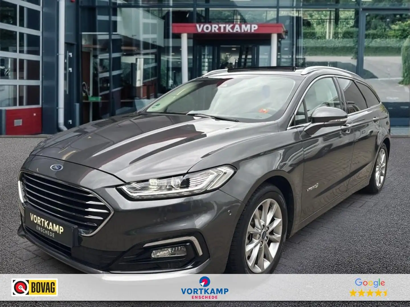 Ford Mondeo 2.0 IVCT HEV TITANIUM PANO-DAK/TREKHAAK/MEMORY/CAM Grijs - 1