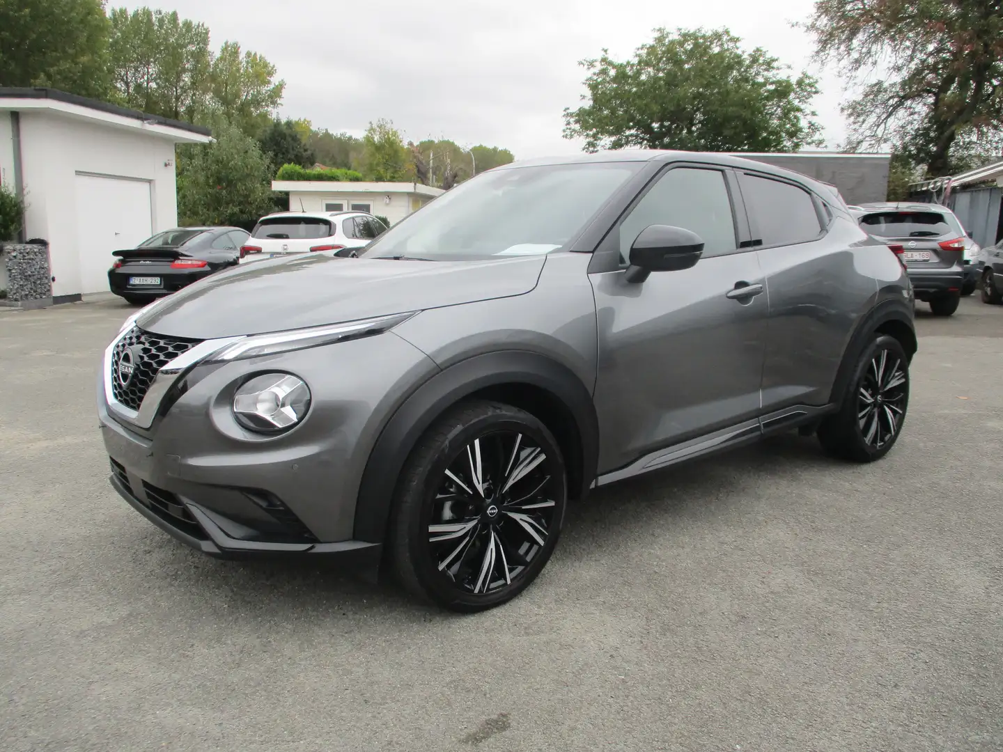 Nissan Juke 1.0 DIG-T N-Design Bose/Carplay/Camera/Leder Gris - 1