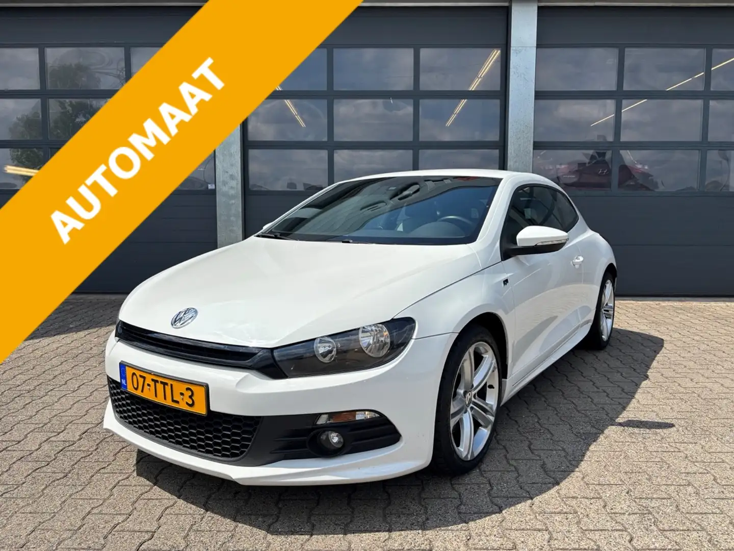 Volkswagen Scirocco 2.0 TSI 210 pk Automaat R-Line Wit - 1