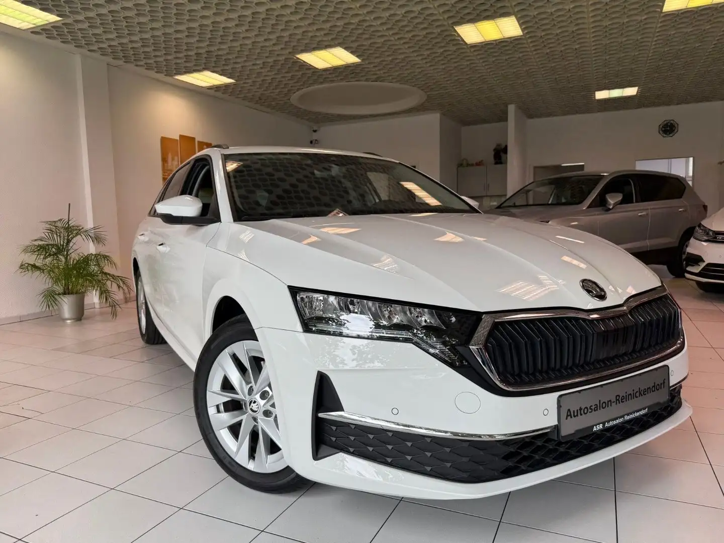 Skoda Octavia Combi 1.5 TSI Selection*ACC*LED*Navi* Weiß - 1