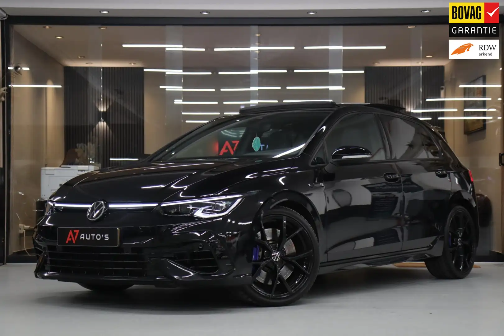 Volkswagen Golf 2.0 TSI R 4Motion PERFORMANCE AKRA/PANO/HUD/IQ/H&K Zwart - 1