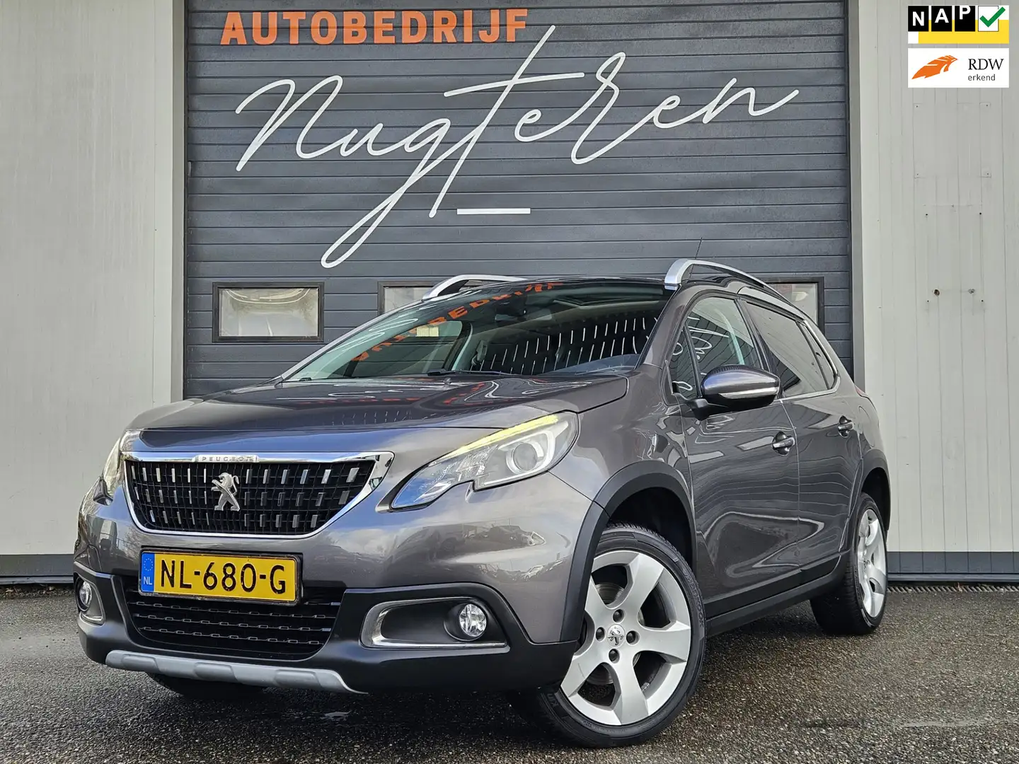 Peugeot 2008 1.2 PureTech Allure|Leer|Navi|Clima|Trekhaak Grau - 1