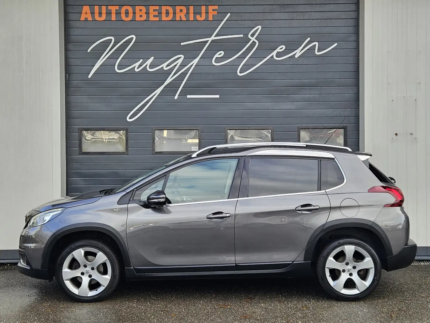 Peugeot 2008 1.2 PureTech Allure|Leer|Navi|Clima|Trekhaak Grau - 2