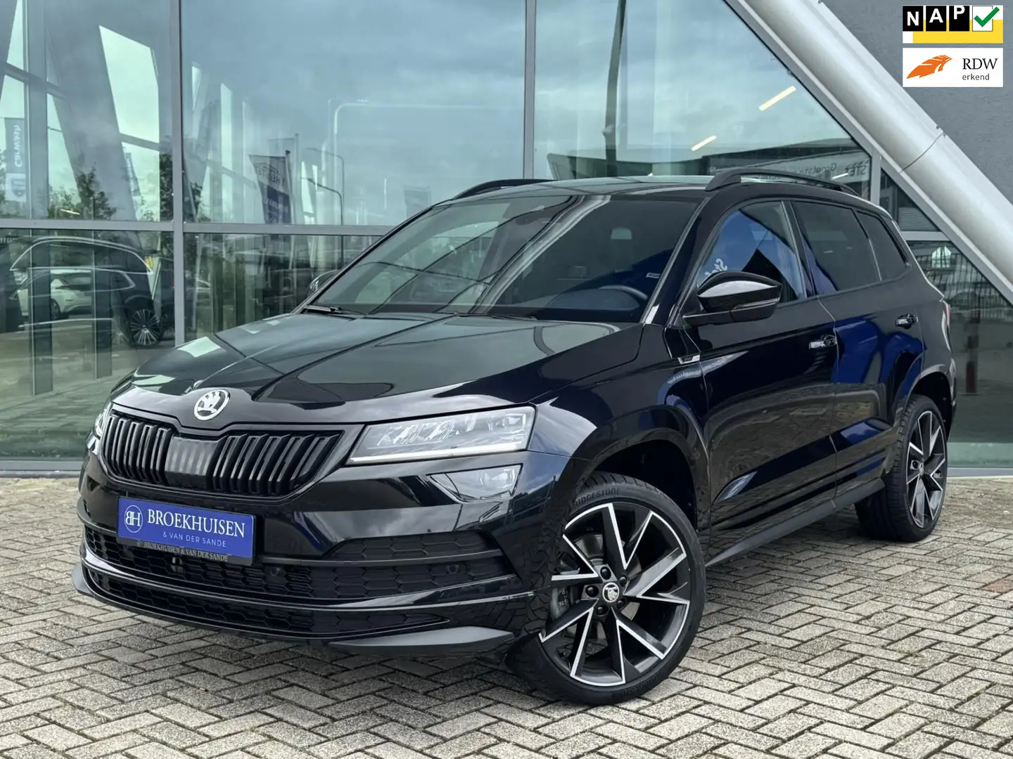 Skoda Karoq 1.5 TSI ACT Sportline Business 150pk Automaat / St Nero - 1