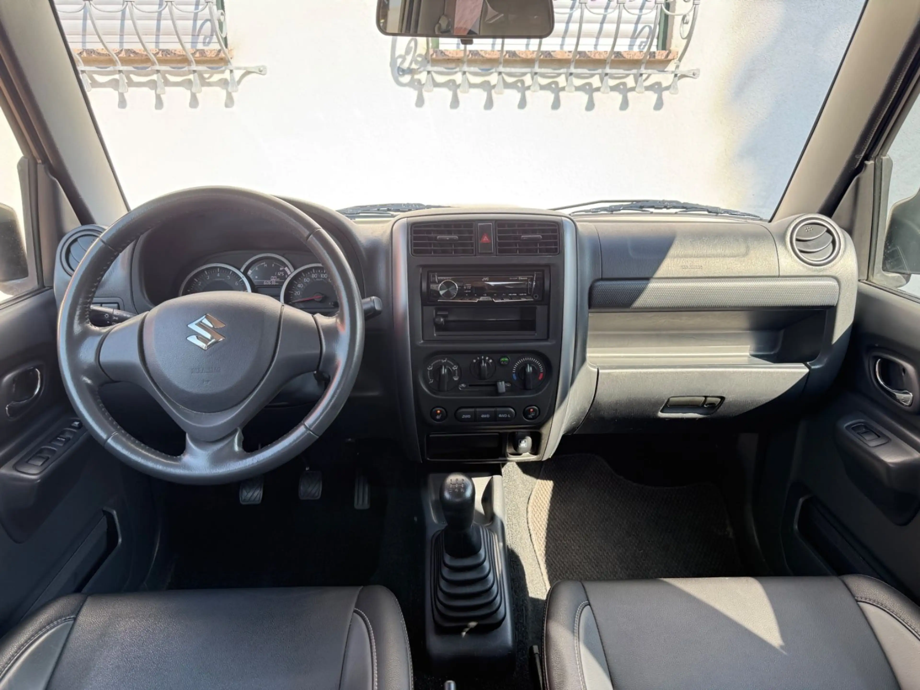 Suzuki Jimny FACELIFT STYLE 4x4 AHK LEDER KLIMA ALU TOP — photo 12