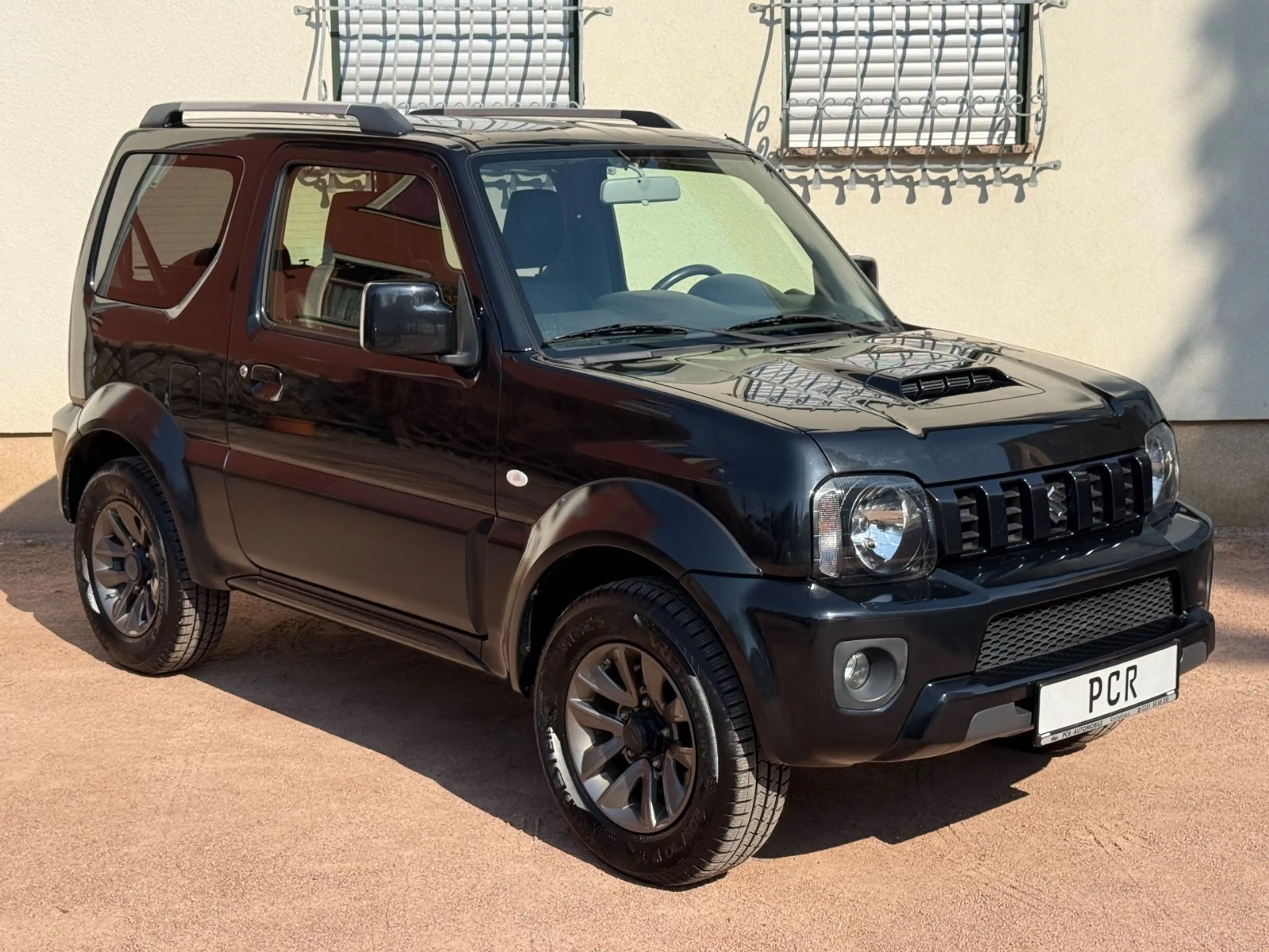 Suzuki Jimny FACELIFT STYLE 4x4 AHK LEDER KLIMA ALU TOP — photo 3