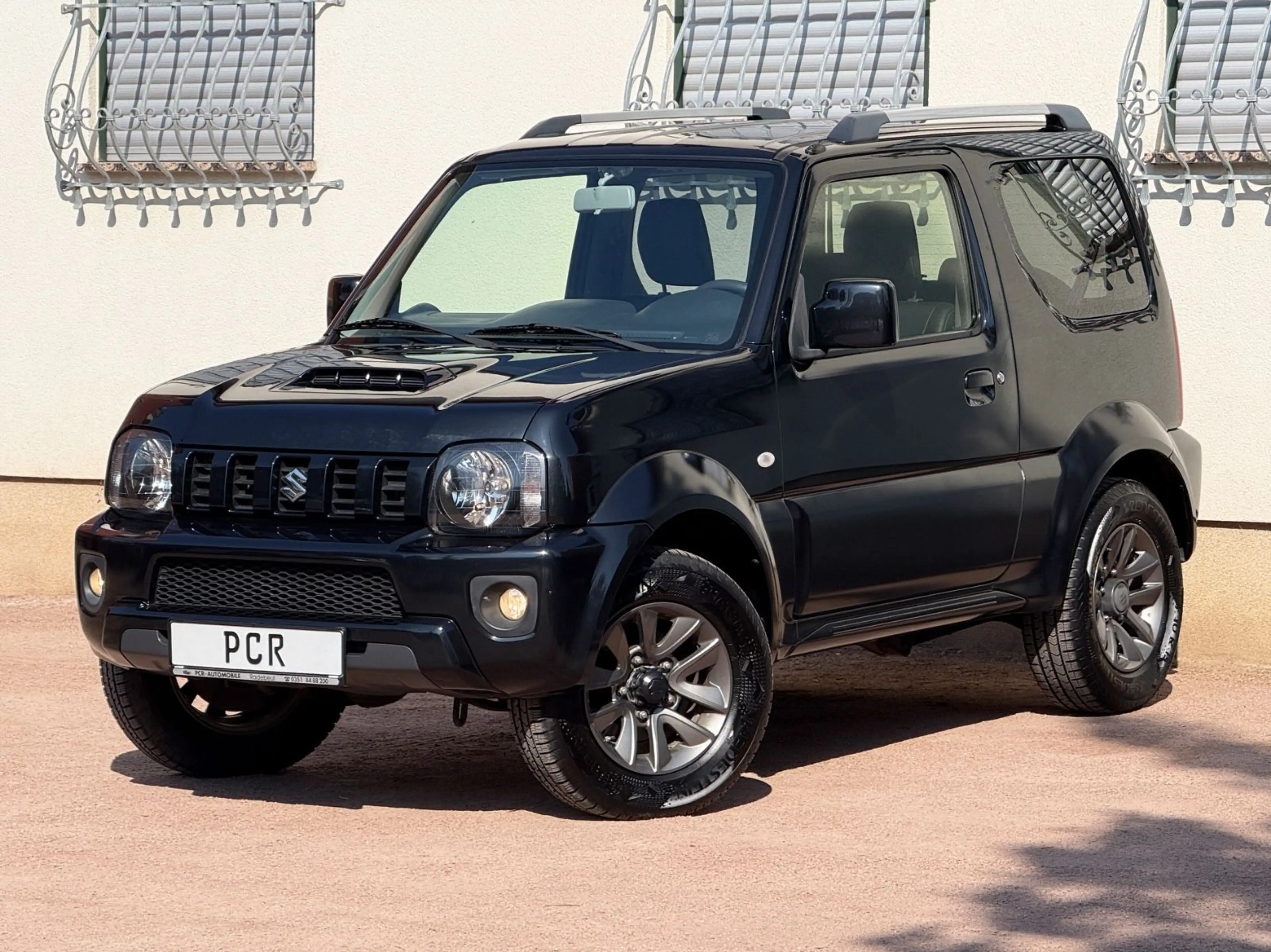 Suzuki Jimny FACELIFT STYLE 4x4 AHK LEDER KLIMA ALU TOP — photo 9