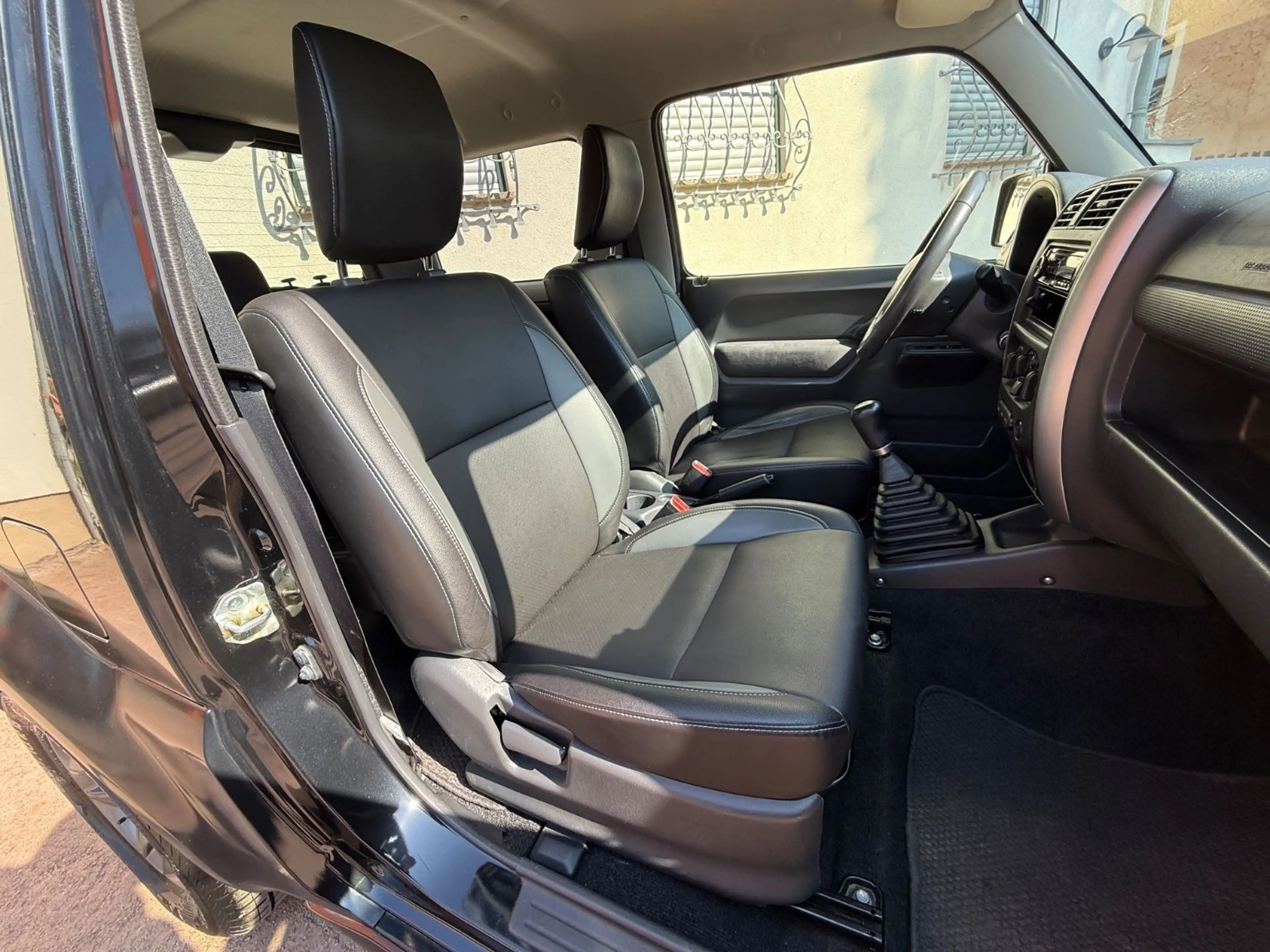 Suzuki Jimny FACELIFT STYLE 4x4 AHK LEDER KLIMA ALU TOP — photo 14