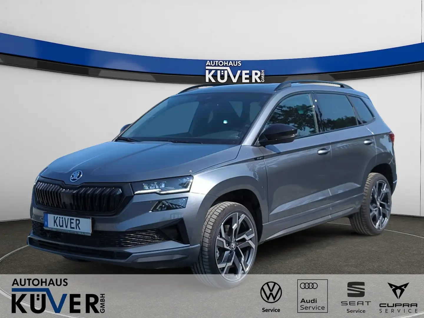 Skoda Karoq Sportline 1,5 TSI DSG Navi+Pano+AHK+Matrix Grijs - 1