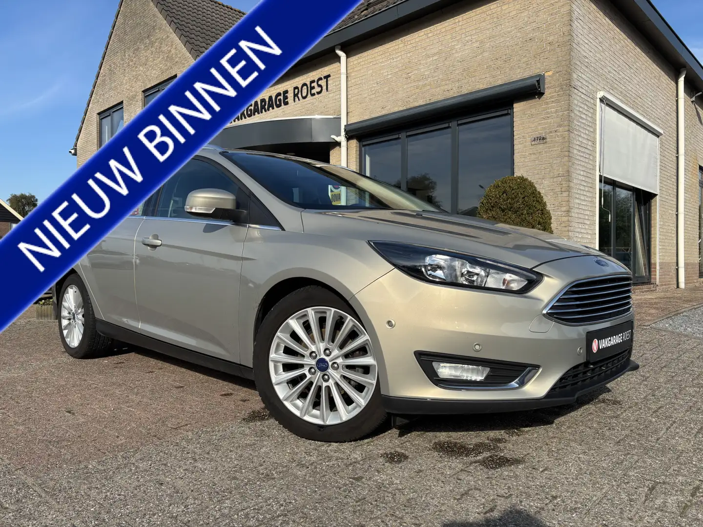 Ford Focus Wagon 1.0 Turbo First Edition Navigatie / All-Seas Gris - 1
