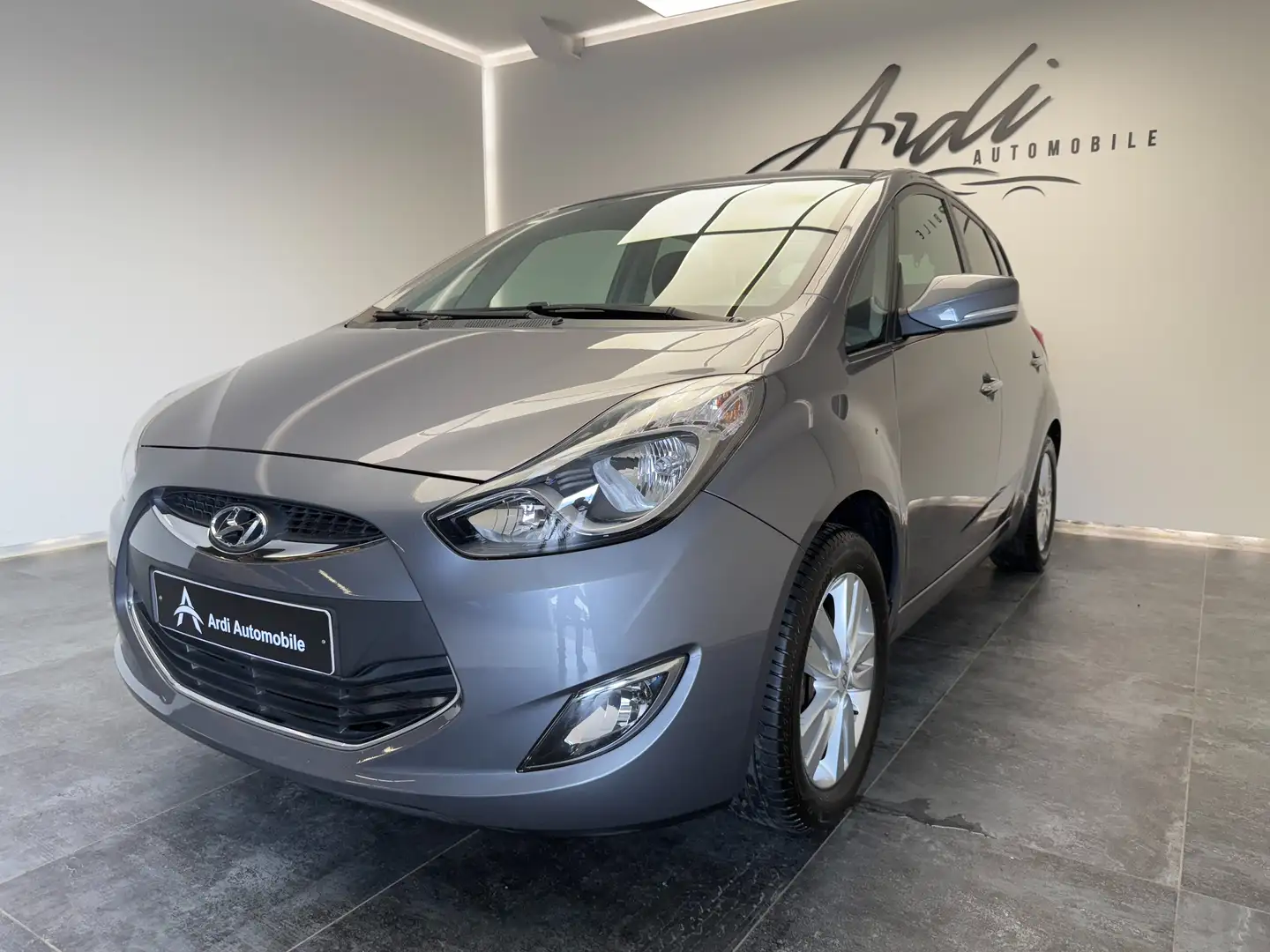 Hyundai iX20 1.4i *CAMERA*GPS*AIRCO*1ER PROP*GARANTIE 12 MOIS* Gris - 1