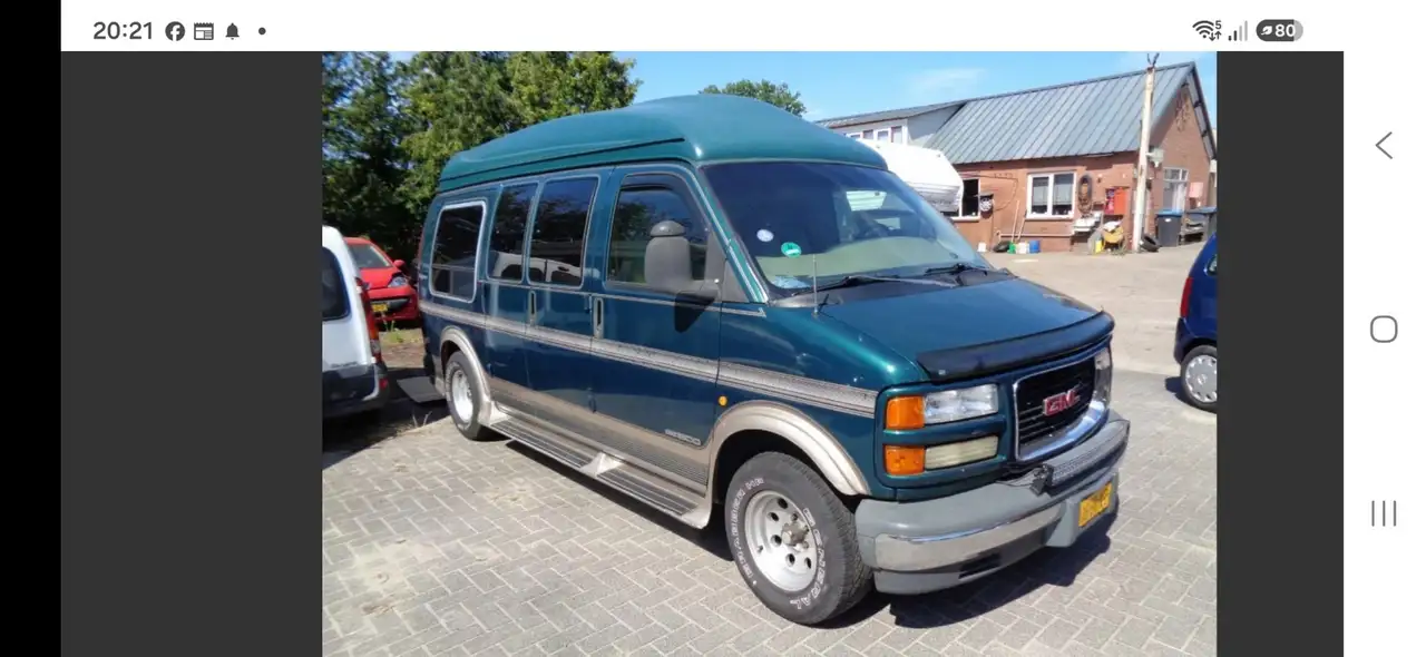gmc-midas savana met motorschade (gat in carter), foto 1