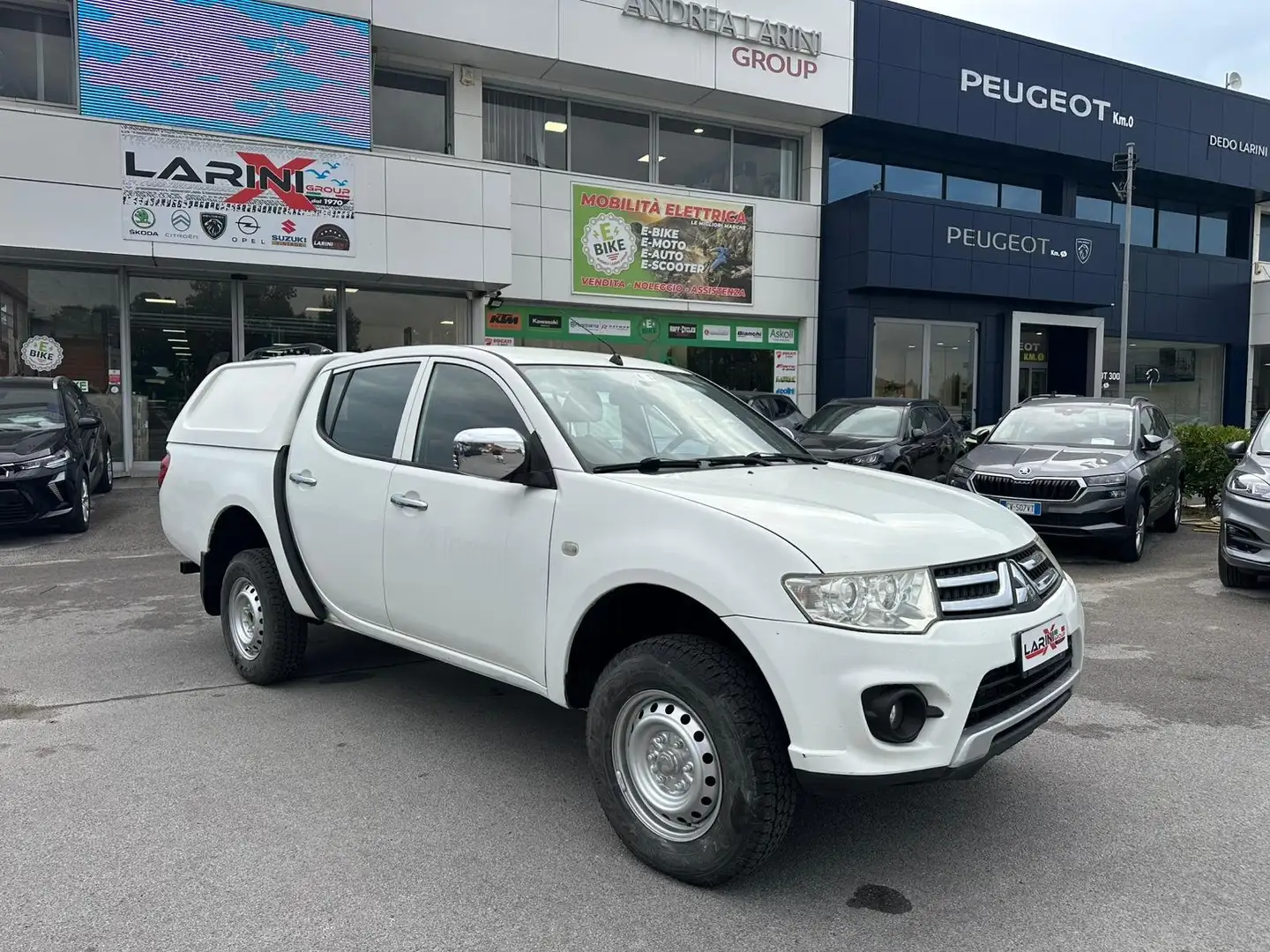 Mitsubishi L200 L200 Cab IV 2010 d.cab 2.5 di-d Invite N1 5POSTI Weiß - 1