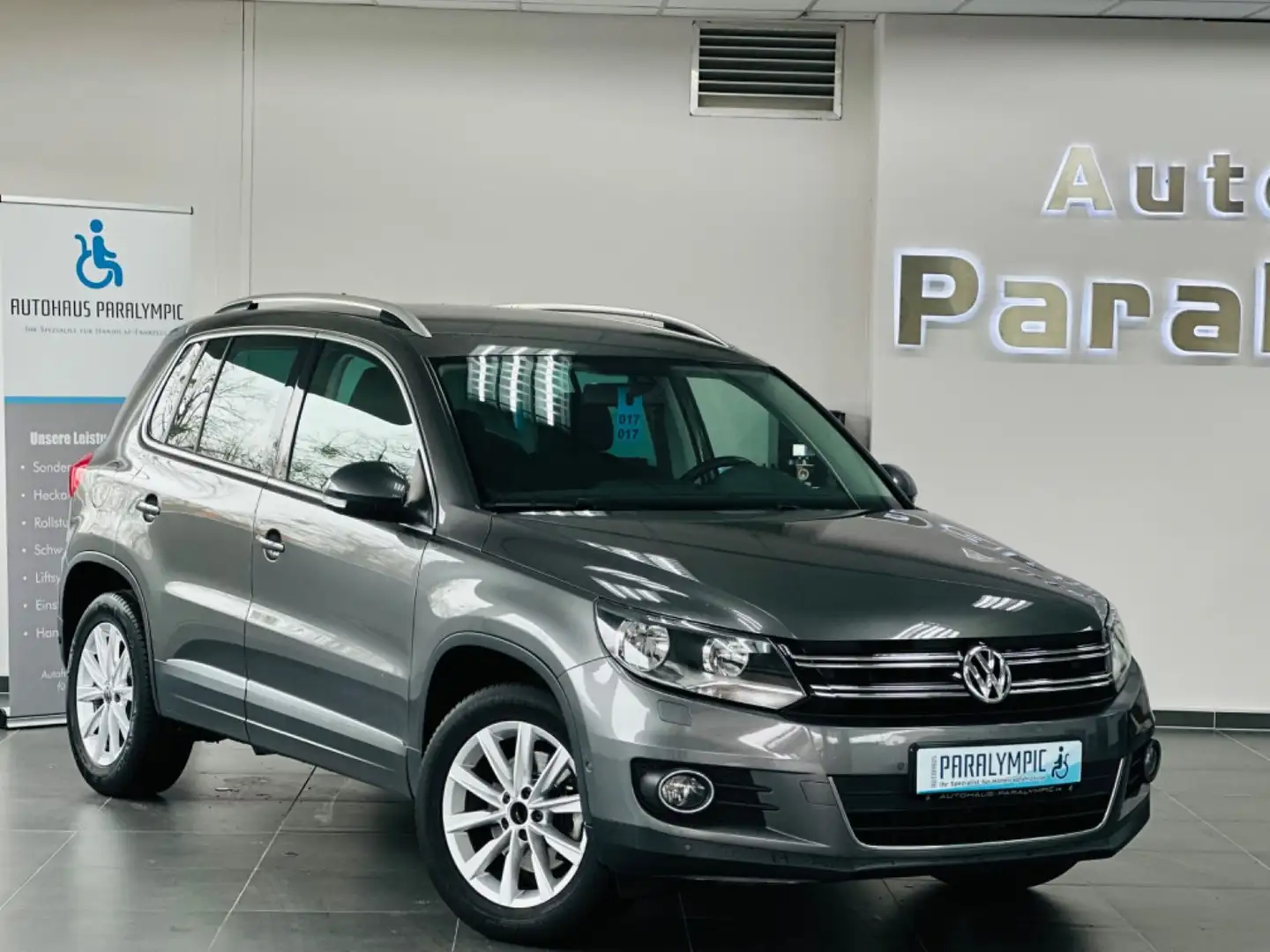 Volkswagen Tiguan Sport & Style 1.4 TSI DSG *SHZ*PDC Grigio - 1