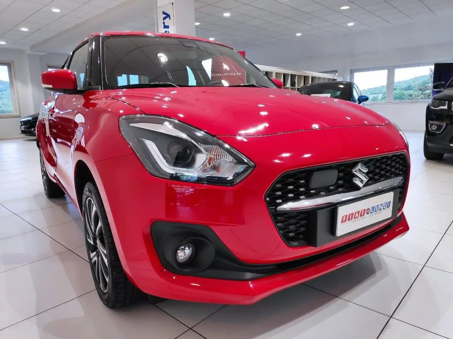Suzuki Swift 1.2 Hybrid 4WD AllGrip Top *GANCIO TRAINO*29.000 Rosso - 1