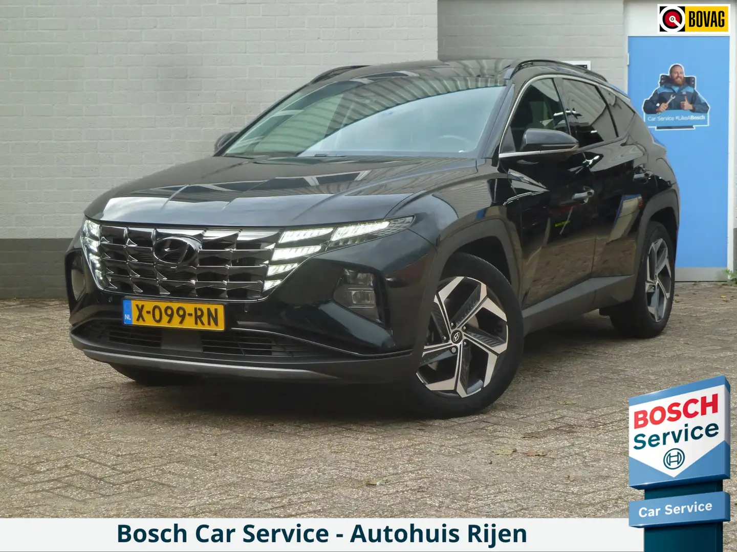 Hyundai TUCSON 1.6 T-GDI PHEV Comfort 4WD|Panodak|Navi|Stoel/Stuu Zwart - 1