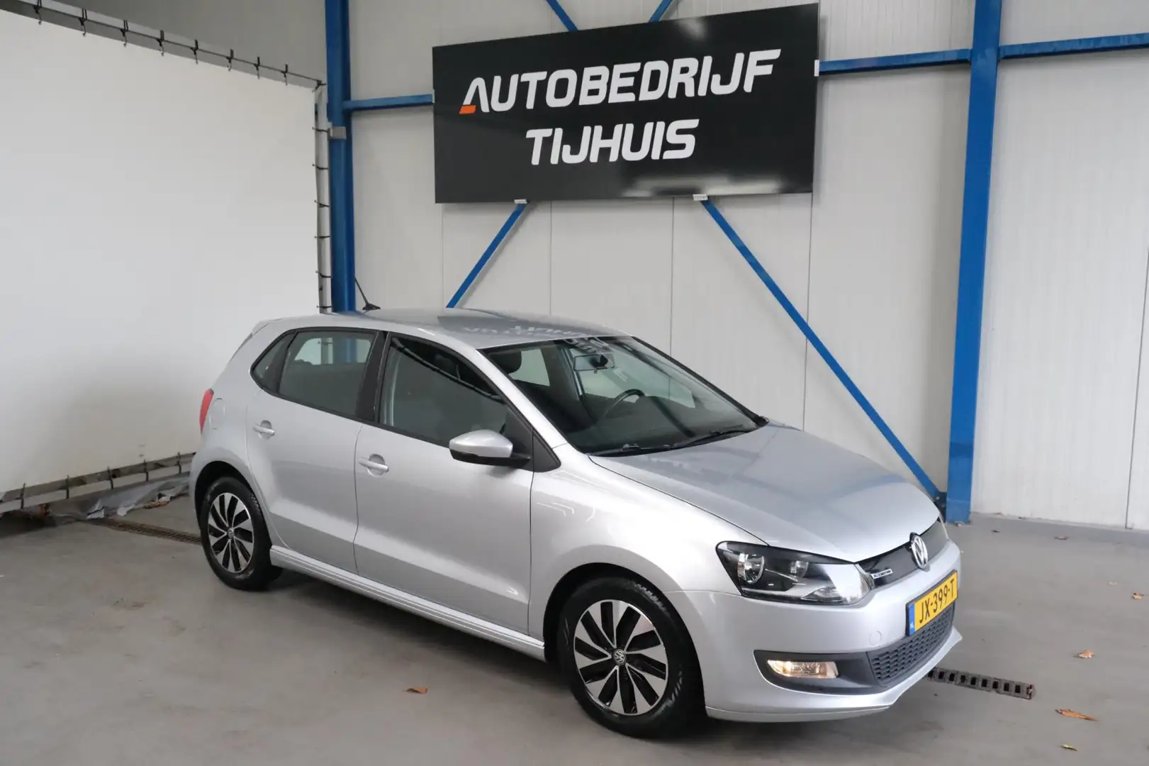 Volkswagen Polo 1.0 BlueMotion - N.A.P. Airco, Cruise, Navi, Carpl Grijs - 1