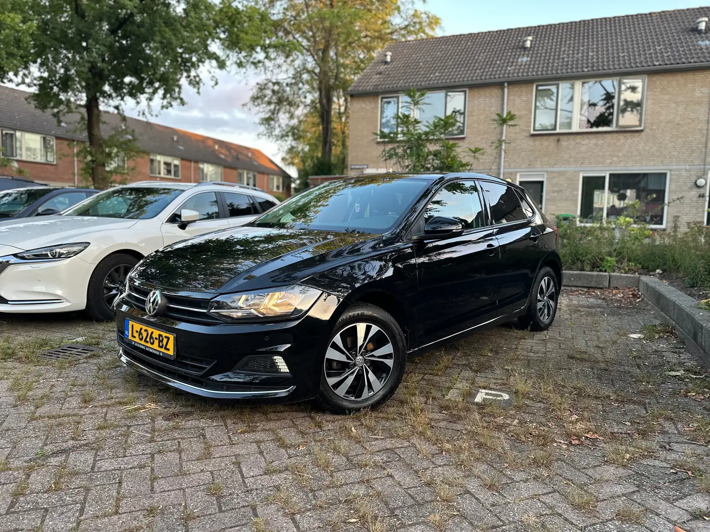 Volkswagen Polo Polo 1.0 TSI Highl.BnsR Zwart - 1