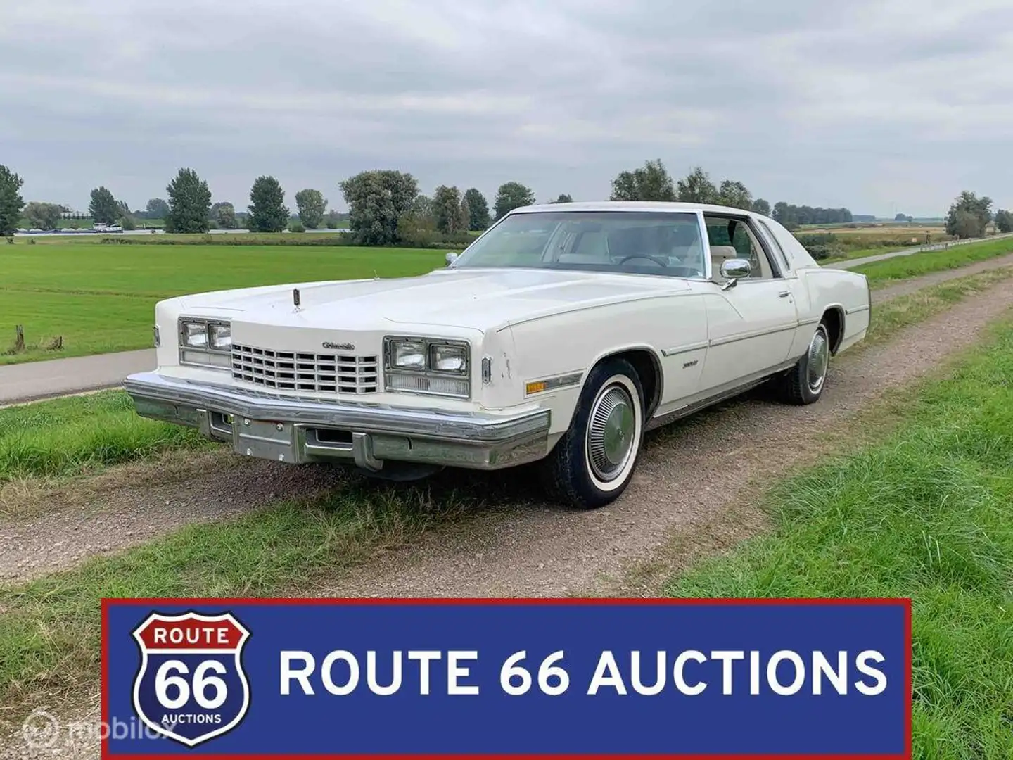 Oldsmobile Toronado | 1977 | Route 66 Auctions Schwarz - 1