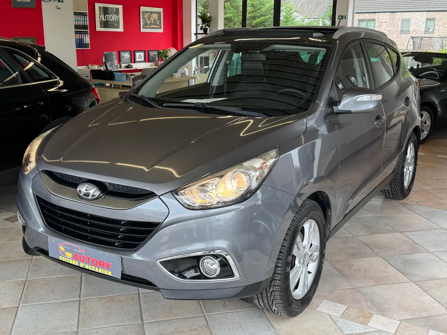 Hyundai iX35 ix35 1.6 GDi 135 2WD Blue Drive Pack Confort Grijs - 1