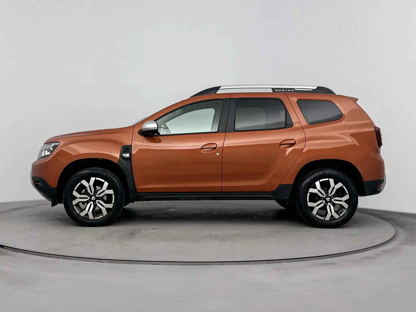 Dacia Duster 1.0 TCe Bi-Fuel Prestige 100PK | Navigatie | Achte Orange - 2