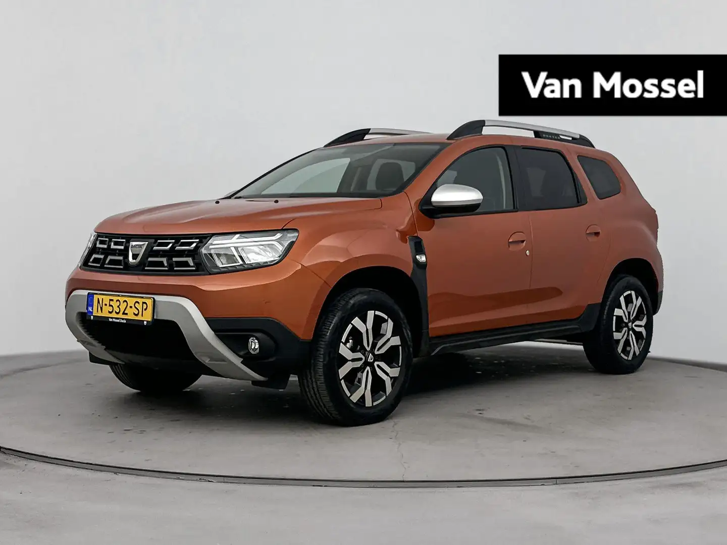 Dacia Duster 1.0 TCe Bi-Fuel Prestige 100PK | Navigatie | Achte Orange - 1