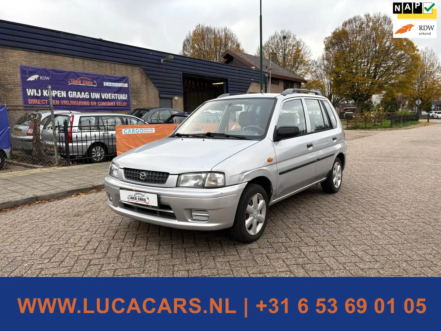 Mazda Demio 1.3 GLX Plus NIEUWE APK! Grau - 1