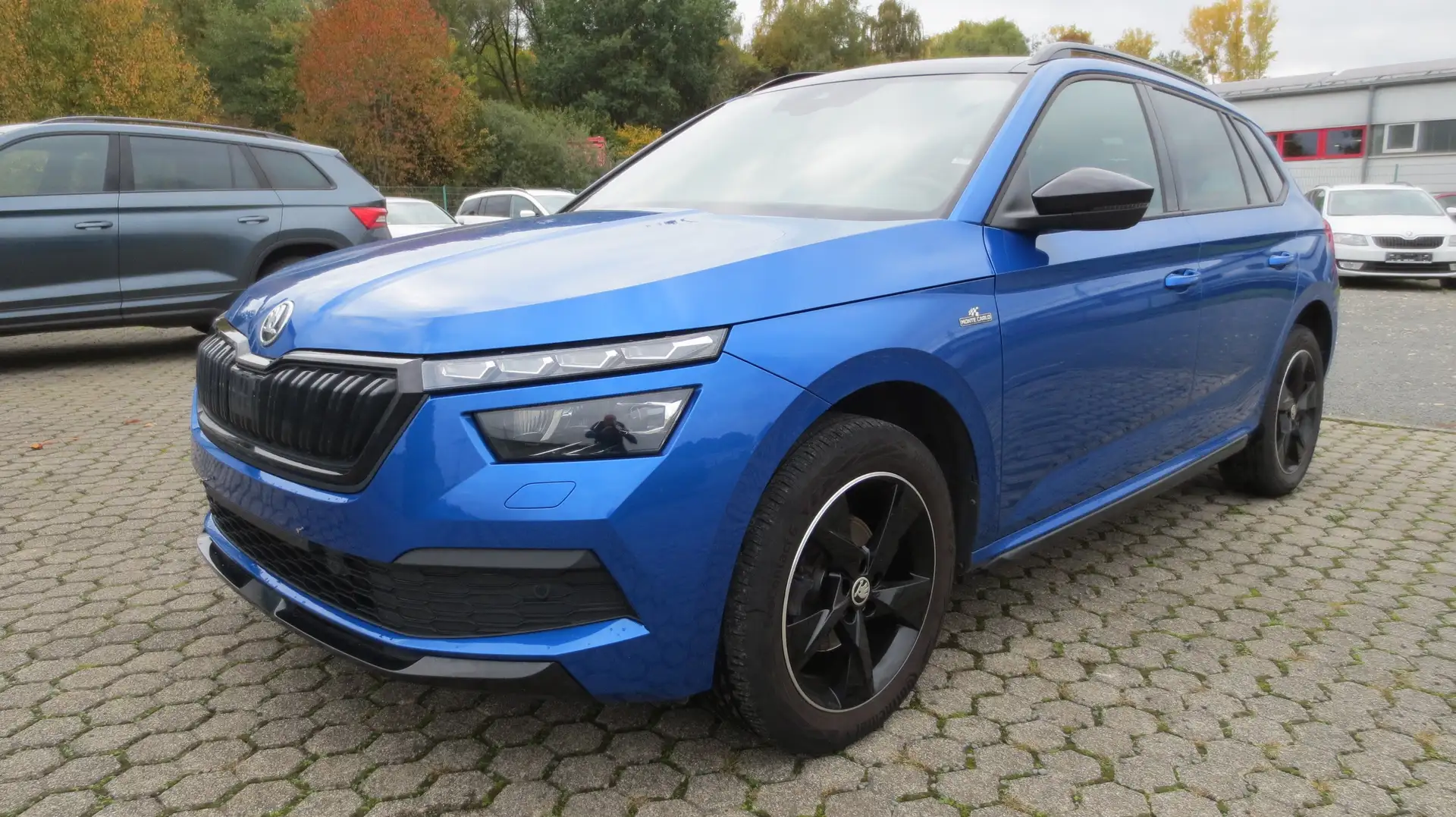 Skoda Kamiq DSG Monte Carlo *NAVI/LED/PANO* Blau - 1