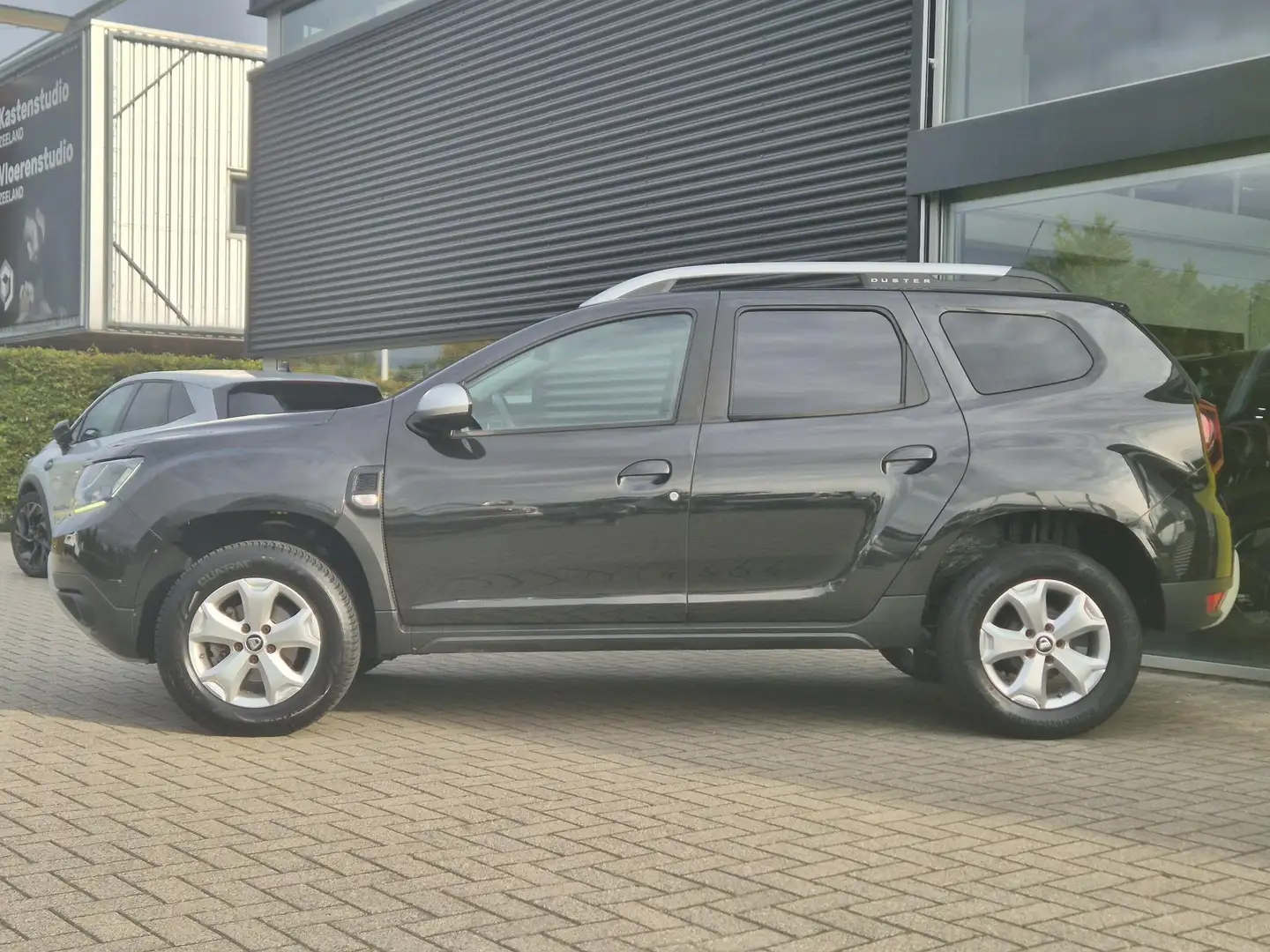 Dacia Duster TCe 125 Comfort Navigatie, Camera, Bluetooth, Crui Zwart - 2