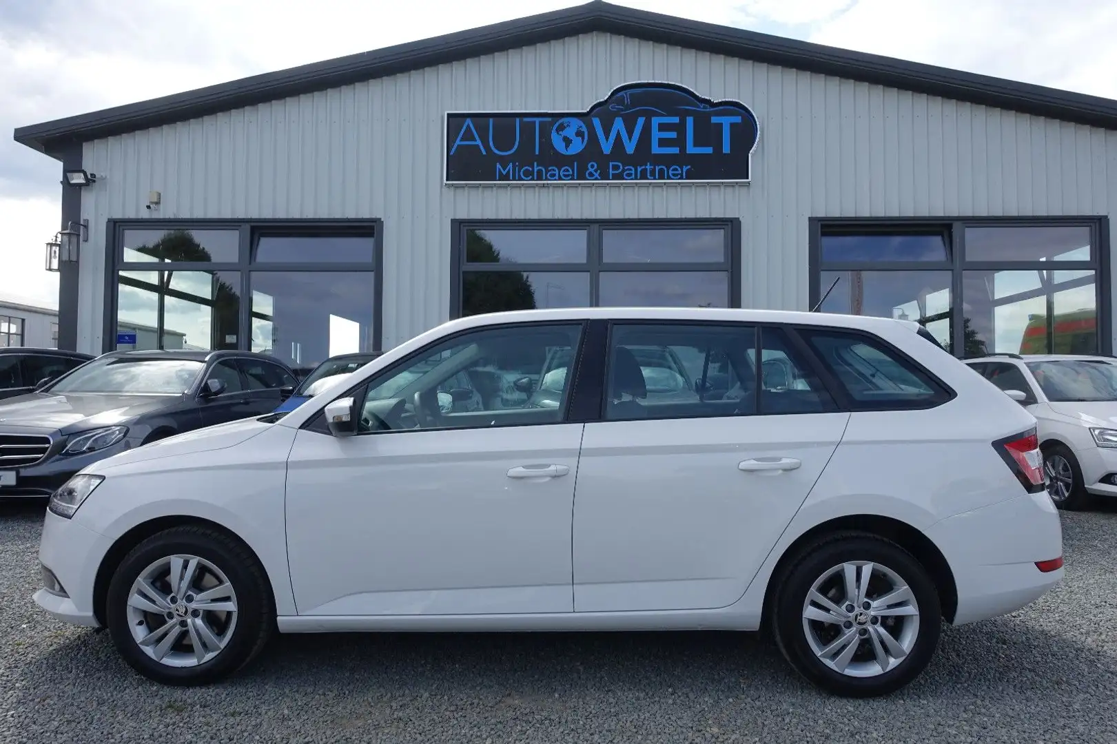 Skoda Fabia 1.0 TSI 6 Gang KLIMA APP PDC TEMP TÜV NEU Weiß - 1