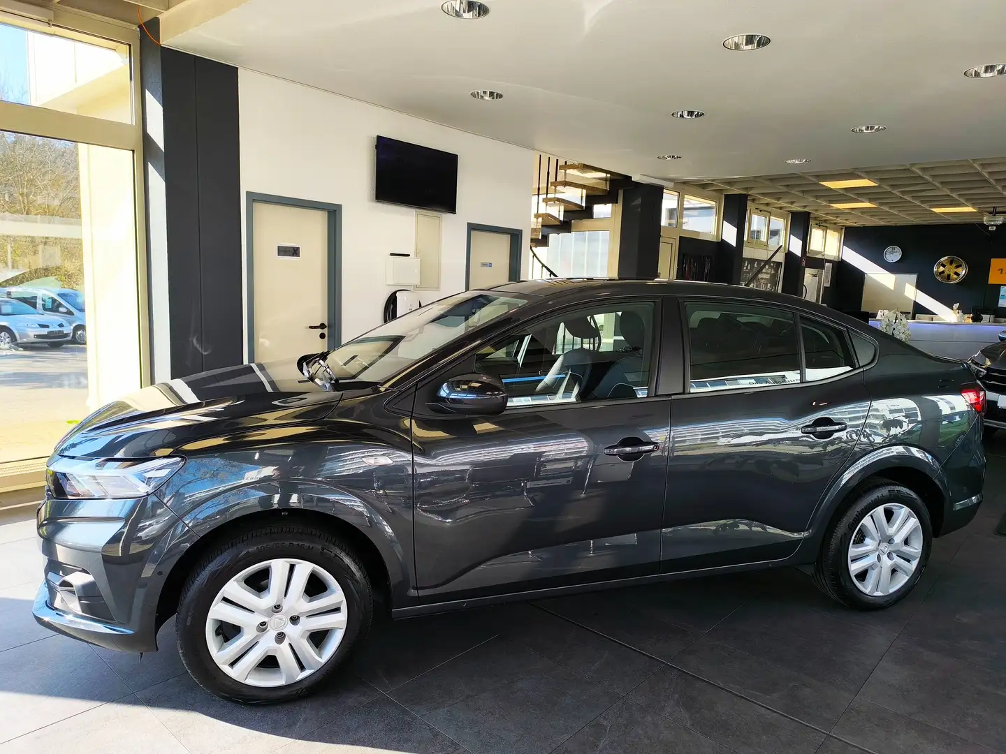 Dacia Logan Lim.-Comfort-PDC v.u.h.-Klima.-Navig.-Bluet.- Grau - 2
