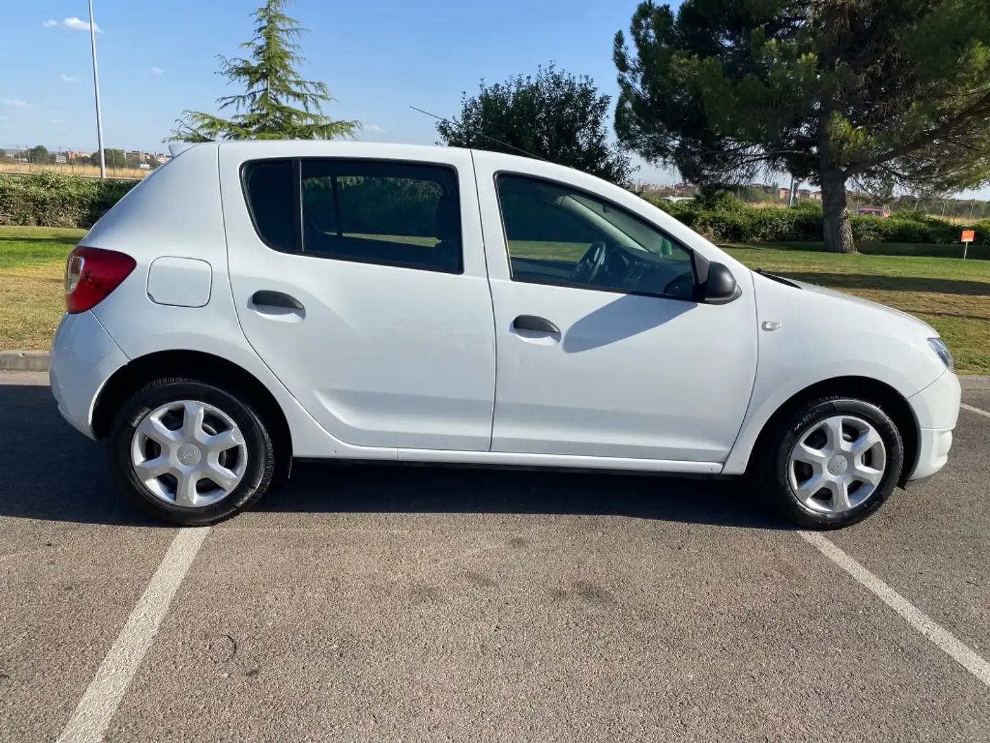 Dacia Sandero 1.2 GLP Ambiance Blanc - 1
