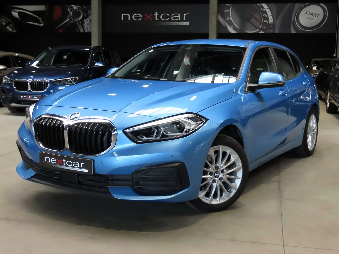 BMW 118 iA Hatch Sportline *FULL LED-NAVI-DIGITAL-PARKING* Blauw - 1
