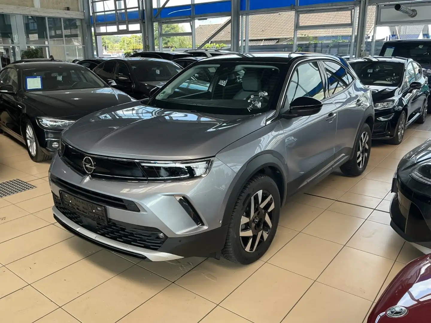 Opel Mokka Elegance*LED*Navi*R.Cam*CarPlay*PDC*1.Hand Silber - 1