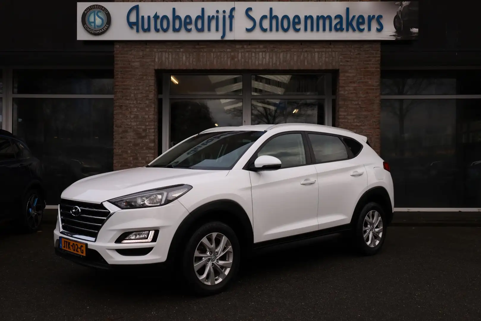Hyundai TUCSON 1.6 GDI Comfort CAMERA CARPLAY STOELVERWARMING NAV Weiß - 1