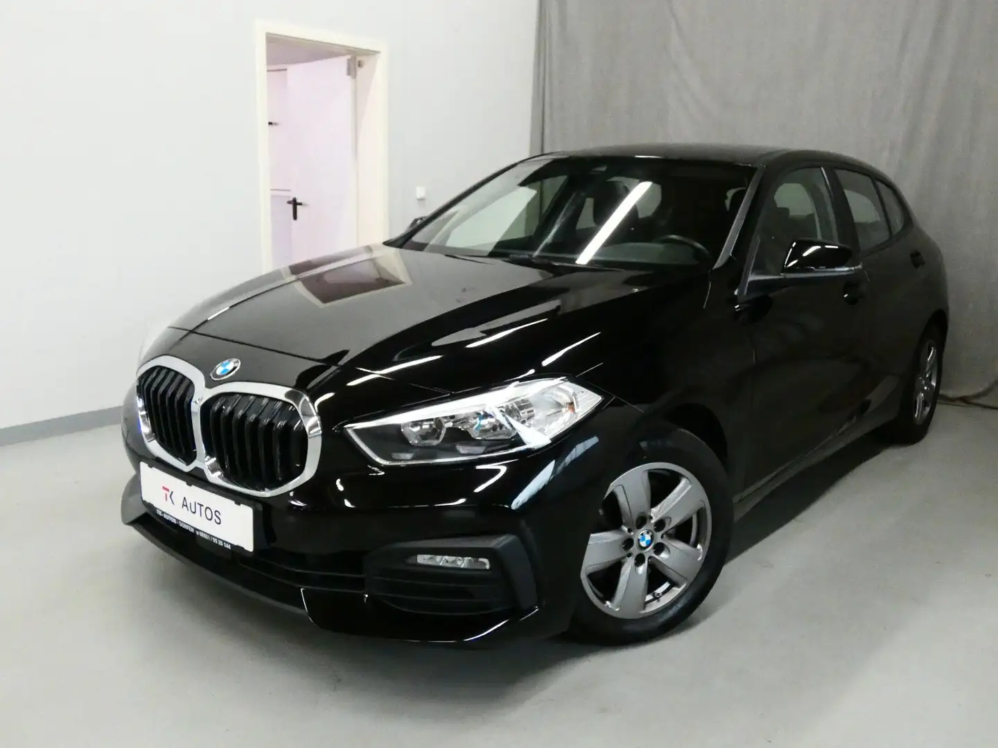 BMW 118 d Lim. Aut.,1.Hand,Klimaaut,Navi,SHZ,S-Heft Schwarz - 1